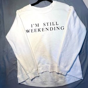 “I’m Still Weekending” white sweatshirt